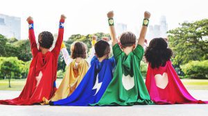 Children dressed as superhero